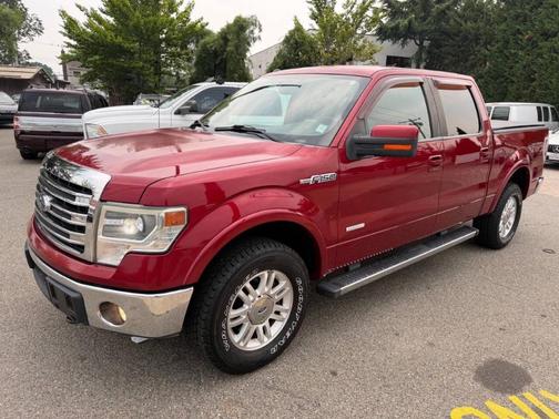 Red 2014 Ford F-150 Lariat