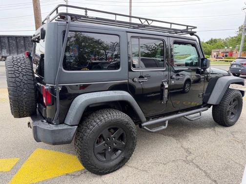 Black 2017 Jeep Wrangler Unlimited Sport