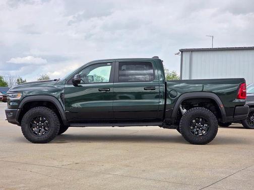 Serrano Green Metallic 2026 RAM 1500 RHO Crew Cab 4x4 5'7' Box
