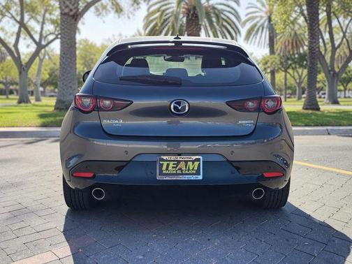 Machine Gray Metallic 2026 Mazda Mazda3 AWD w/Premium Package