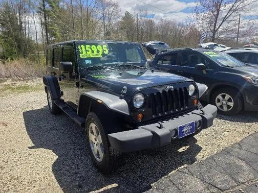 Black Clearcoat 2011 Jeep Wrangler Unlimited Sahara