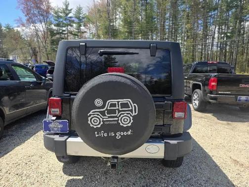 Black Clearcoat 2011 Jeep Wrangler Unlimited Sahara