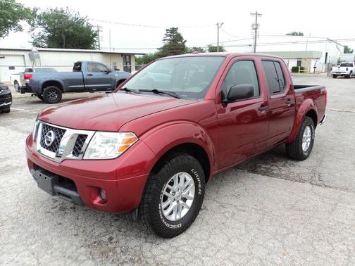 Red 2014 Nissan Frontier SV