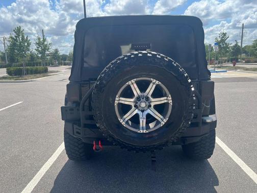 Black Clearcoat 2012 Jeep Wrangler Unlimited Sahara