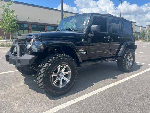 Black Clearcoat 2012 Jeep Wrangler Unlimited Sahara