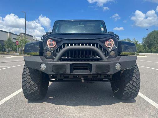 Black Clearcoat 2012 Jeep Wrangler Unlimited Sahara
