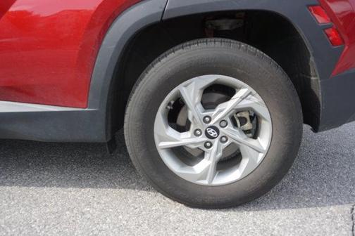 Red 2024 Hyundai TUCSON SE