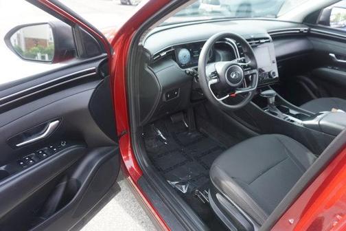Red 2024 Hyundai TUCSON SE