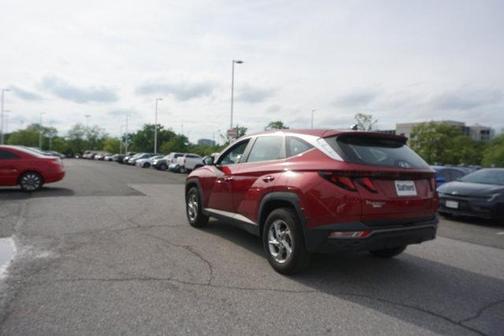 Red 2024 Hyundai TUCSON SE
