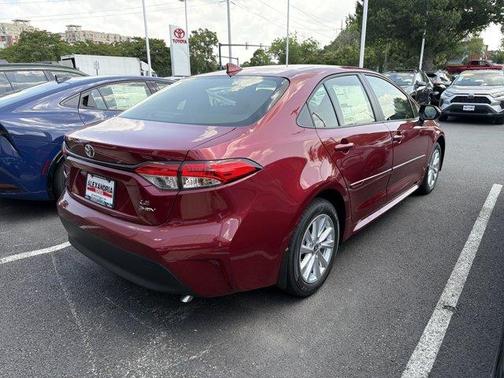 Ruby Flare Pearl 2026 Toyota Corolla Hybrid LE