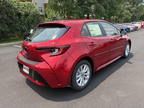 Red 2026 Toyota Corolla Hatchback SE