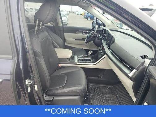 Deep Chroma Blue 2023 Kia Carnival LX Seat Package