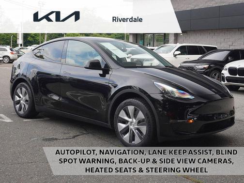 Solid Black 2024 Tesla Model Y Long Range Dual Motor All-Wheel Drive