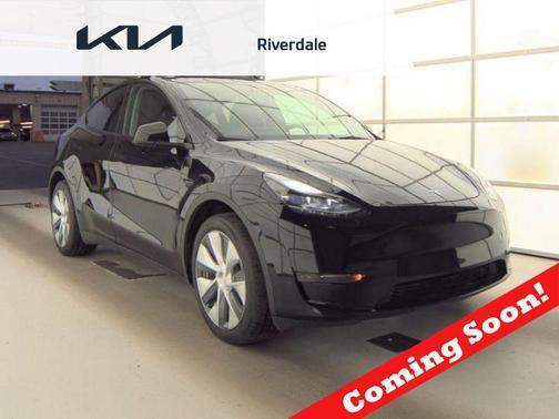 Solid Black 2024 Tesla Model Y Long Range Dual Motor All-Wheel Drive
