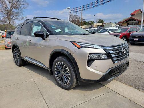 Champagne Silver Metallic/Super Black 2026 Nissan Rogue Platinum