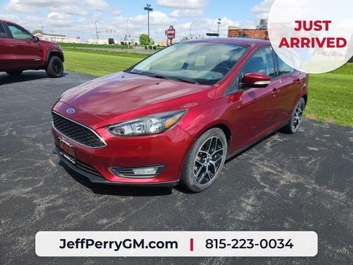 Ruby Red Metallic 2017 Ford Focus SEL