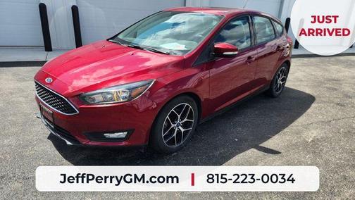 Ruby Red Metallic 2017 Ford Focus SEL