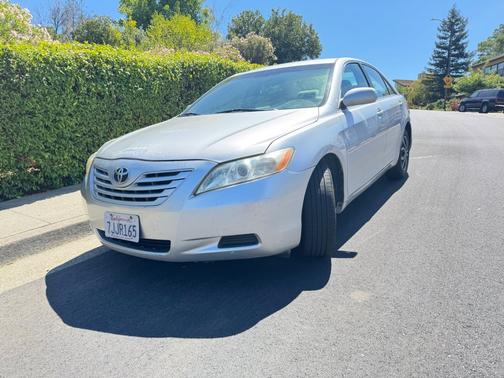 Classic Silver Metallic 2009 Toyota Camry 4dr Sdn I4 Auto LE (Natl)