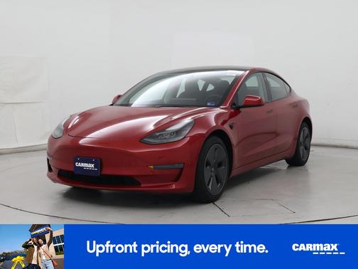 Red 2023 Tesla Model 3