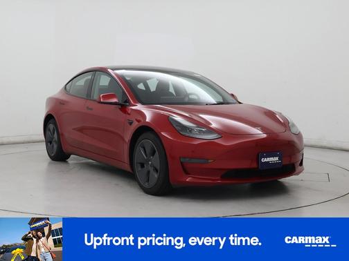 Red 2023 Tesla Model 3