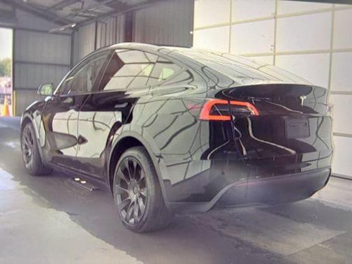 Solid Black 2025 Tesla Model Y Long Range Dual Motor All-Wheel Drive