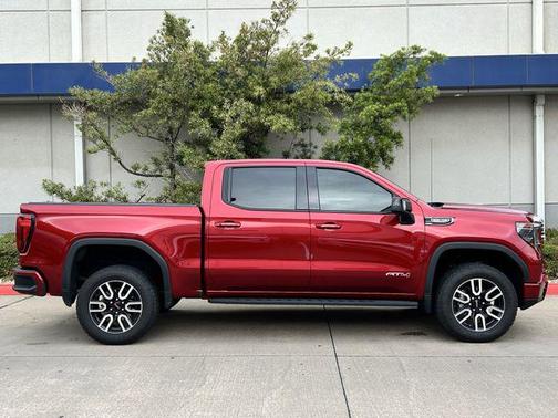 Volcanic Red Tintcoat 2023 GMC Sierra 1500 AT4