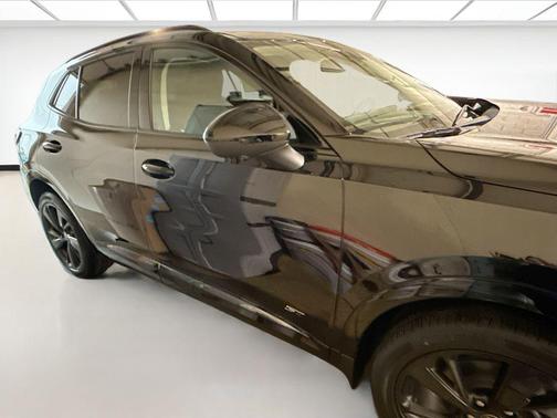 Ebony Twilight Metallic 2026 Buick Envision Sport Touring