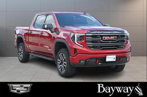 Volcanic Red Tintcoat 2026 GMC Sierra 1500 AT4