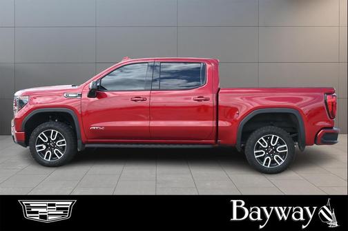 Volcanic Red Tintcoat 2026 GMC Sierra 1500 AT4