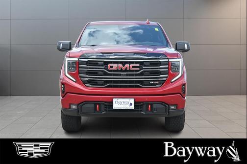 Volcanic Red Tintcoat 2026 GMC Sierra 1500 AT4
