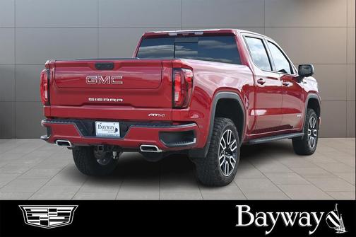 Volcanic Red Tintcoat 2026 GMC Sierra 1500 AT4