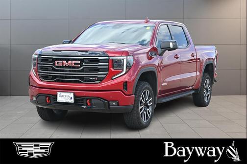 Volcanic Red Tintcoat 2026 GMC Sierra 1500 AT4