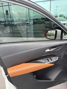Crystal White Tri-Coat 2023 Cadillac XT4 Sport