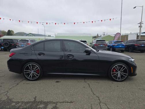 Black Sapphire Metallic 2023 BMW 330 i xDrive