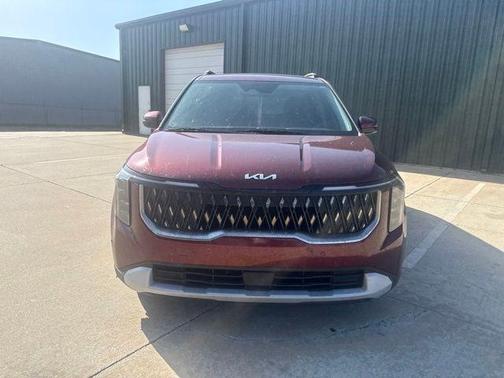 Red Metallic 2025 Kia Carnival EX
