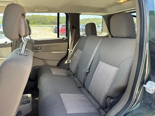 Dark Green 2010 Jeep Liberty Sport