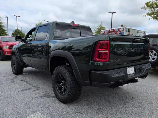 Serrano Green Metallic 2026 RAM 1500 RHO Crew Cab 4x4 5'7' Box