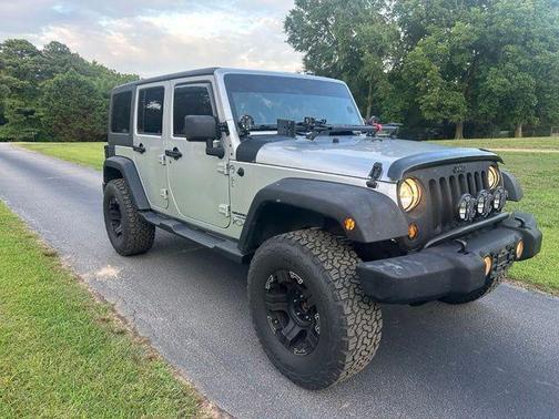 Bright Silver Metallic Clearcoat 2011 Jeep Wrangler Unlimited Sport