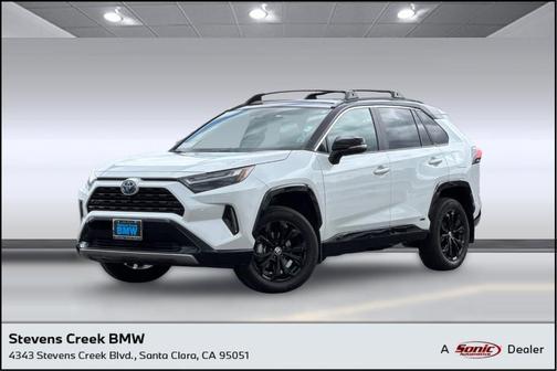 Wind Chill Pearl/Midnight Black Metallic 2024 Toyota RAV4 Hybrid SE