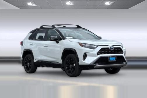 Wind Chill Pearl/Midnight Black Metallic 2024 Toyota RAV4 Hybrid SE