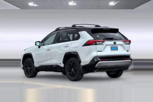 Wind Chill Pearl/Midnight Black Metallic 2024 Toyota RAV4 Hybrid SE