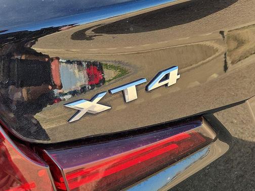 Stellar Black Metallic 2024 Cadillac XT4 Premium Luxury