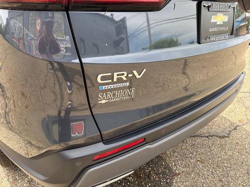 Blue 2025 Honda CR-V Hybrid Sport Touring AWD