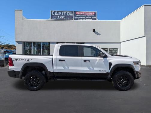 Bright White Clearcoat 2026 RAM 1500 RHO Crew Cab 4x4 5'7' Box