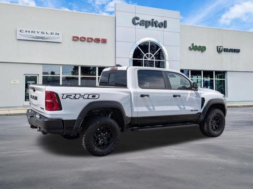 Bright White Clearcoat 2026 RAM 1500 RHO Crew Cab 4x4 5'7' Box
