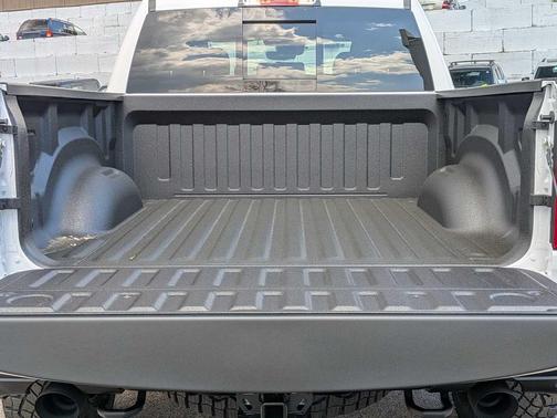 Bright White Clearcoat 2026 RAM 1500 RHO Crew Cab 4x4 5'7' Box