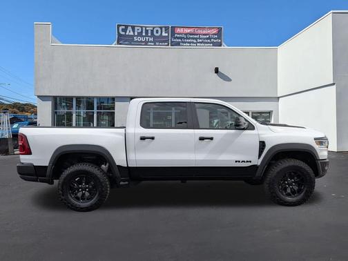 Bright White Clearcoat 2026 RAM 1500 RHO Crew Cab 4x4 5'7' Box