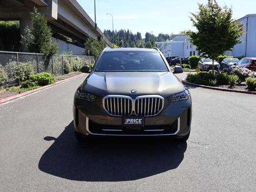 Manhattan Green Metallic 2026 BMW X5 PHEV xDrive50e