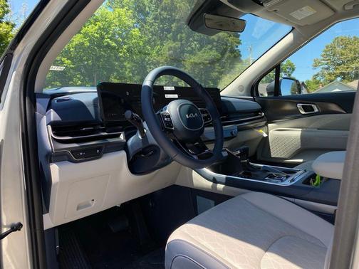 Ivory Silver 2026 Kia Carnival SX