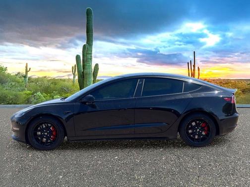 Solid Black 2022 Tesla Model 3 Performance